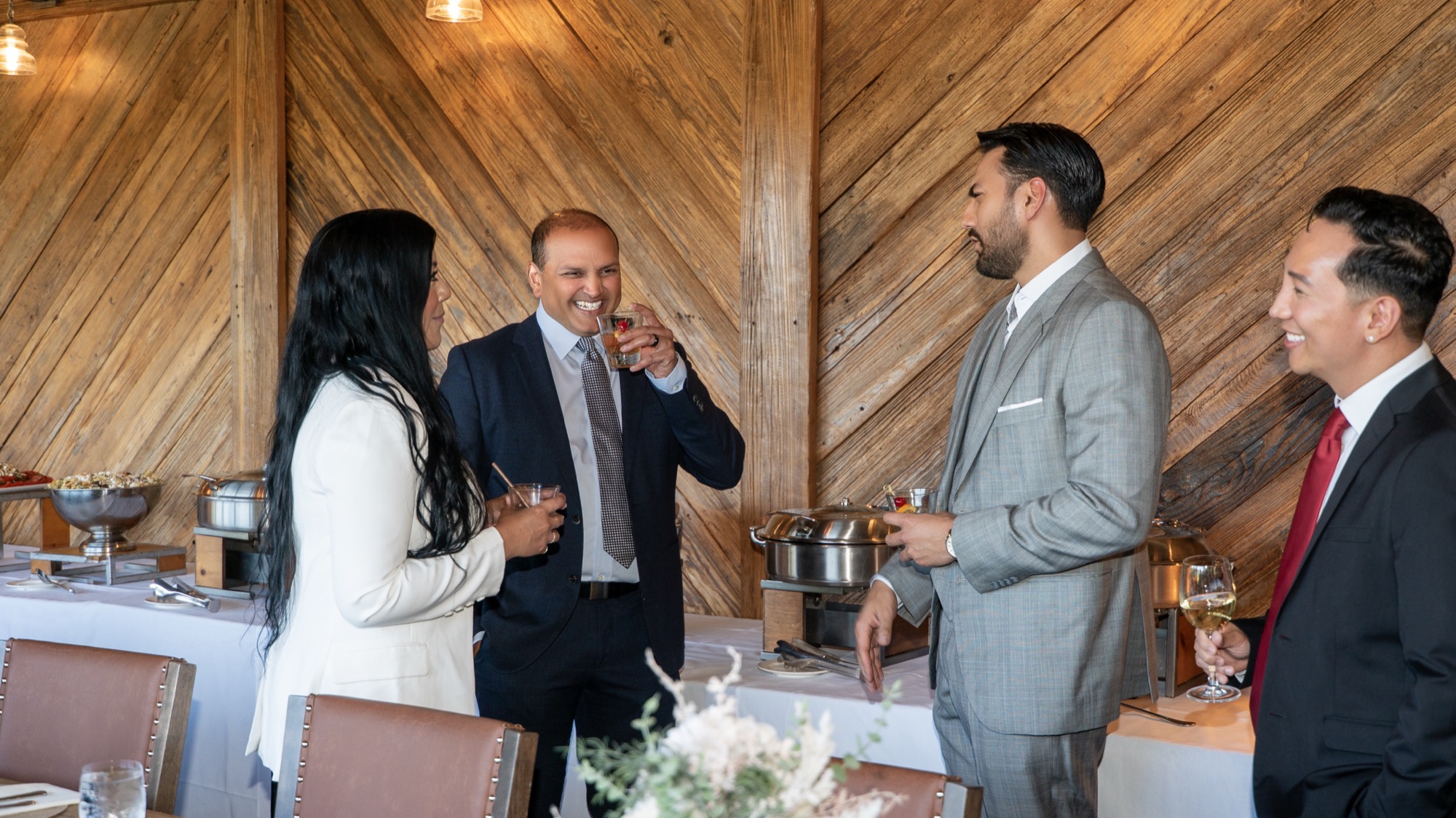 Trinity MSG physicians sharing a laugh over drinks