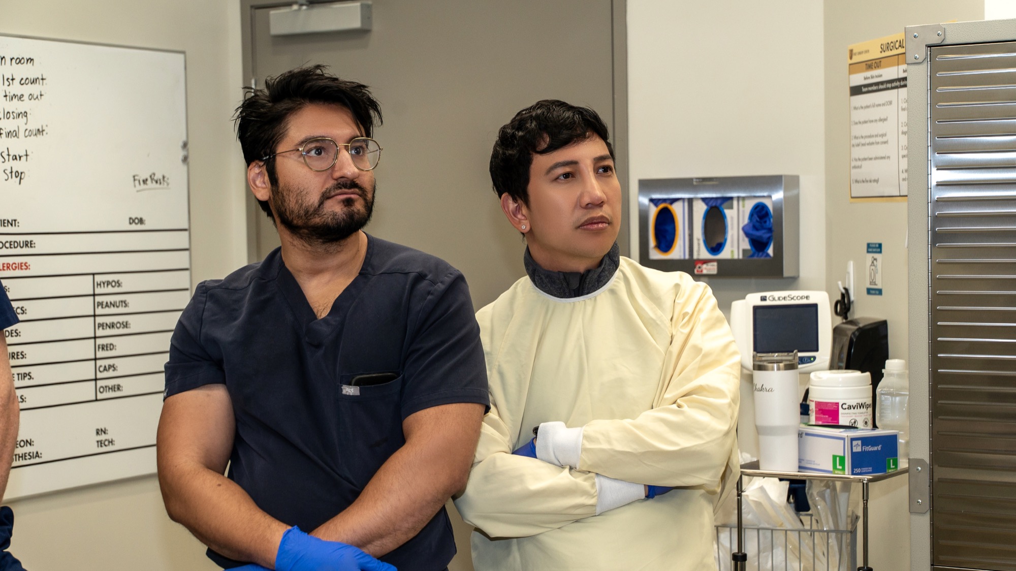 Two fellows watching a demonstration in the endoscopy suite