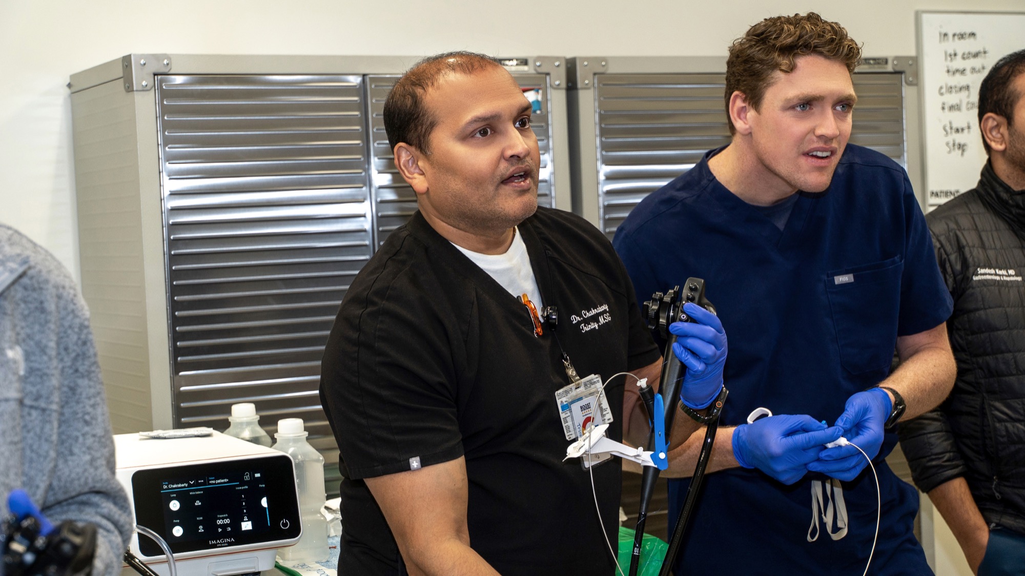 Dr. Chakrabarty and Dr. Trevor Dunbar working the scope side by side