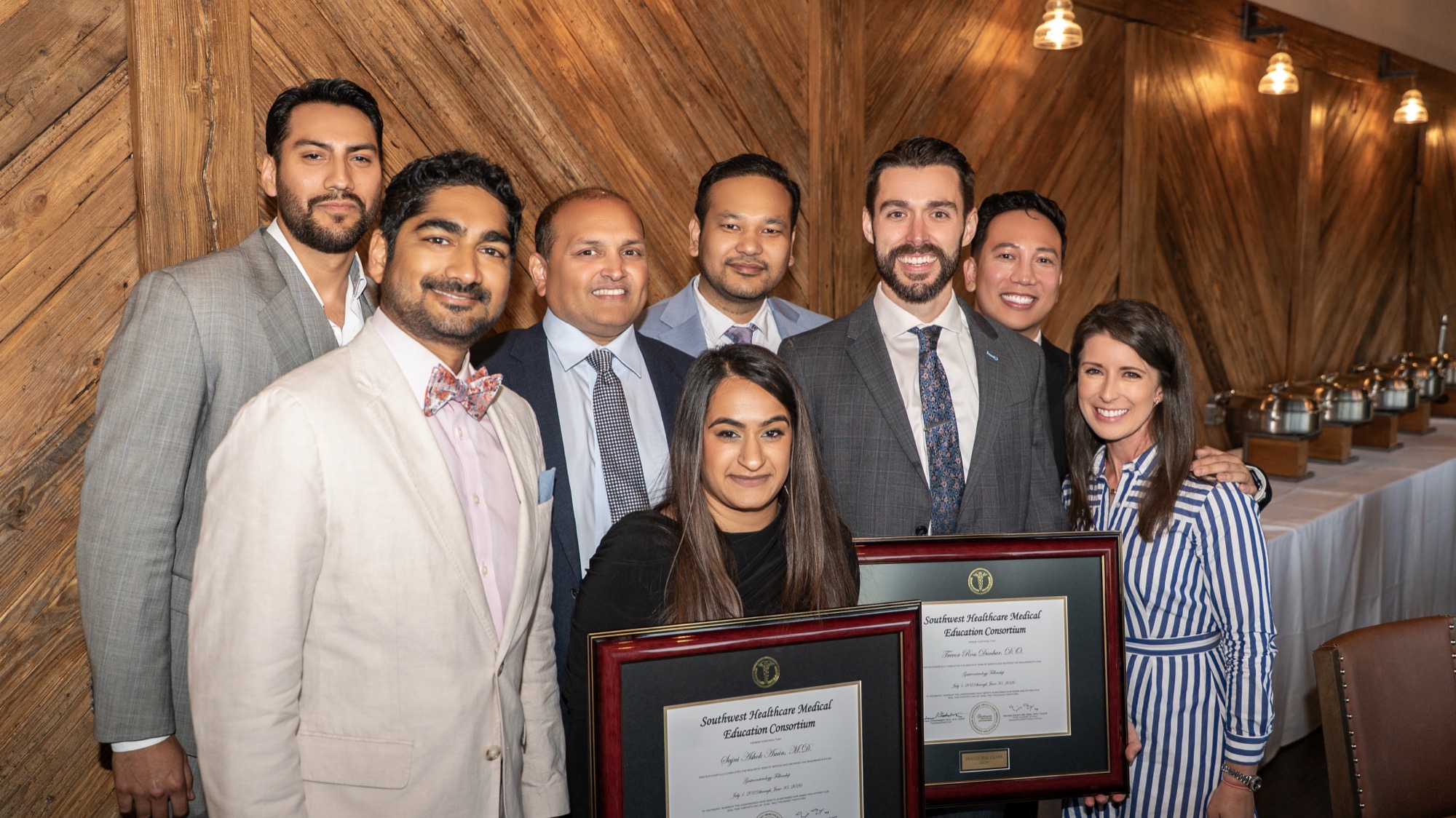 Dr. Sajni Amin and Dr. Trevor Dunbar with mentors holding their fellowship certificates