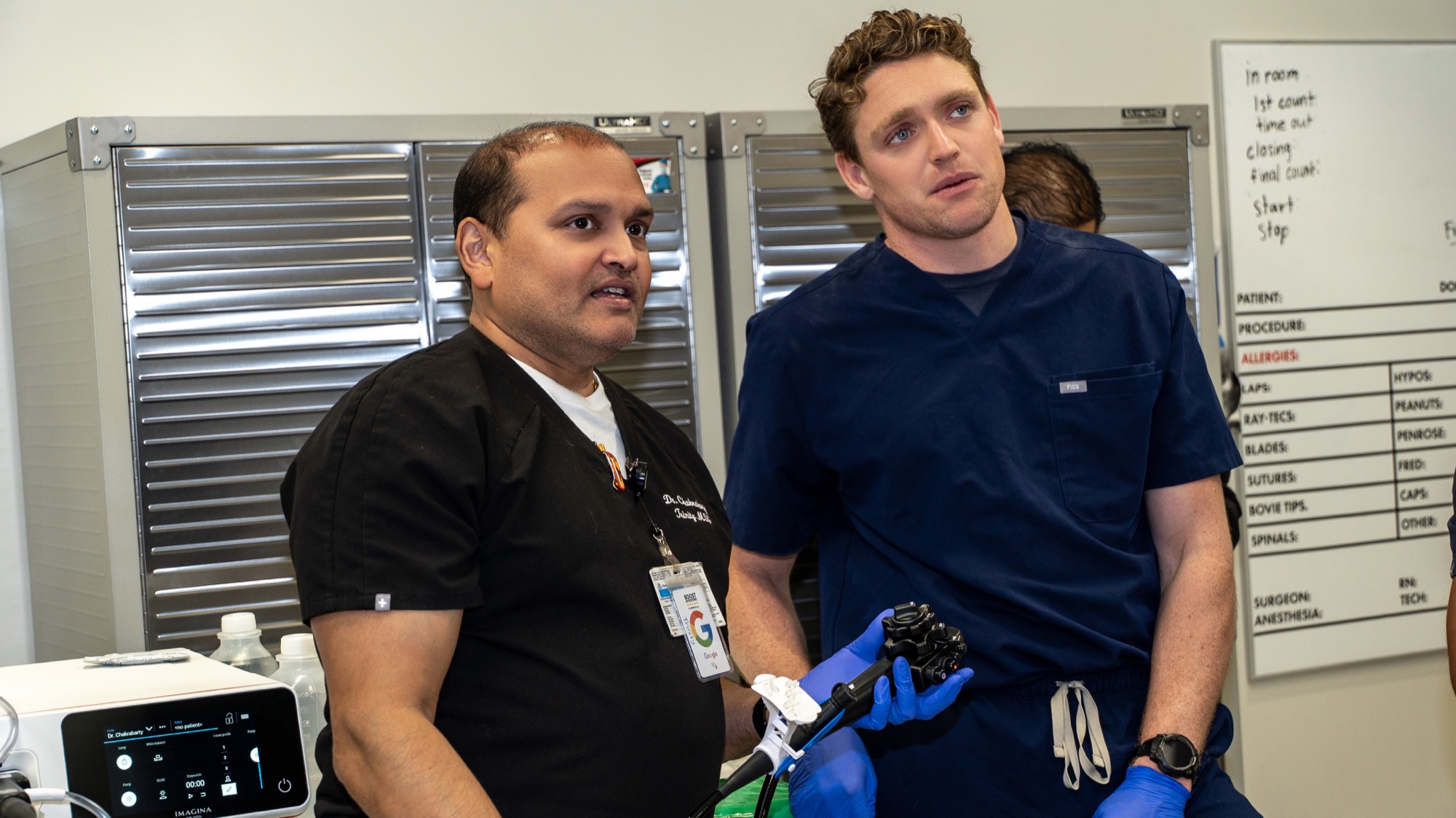 Dr. Chakrabarty coaching Dr. Trevor Dunbar through a scope handling technique