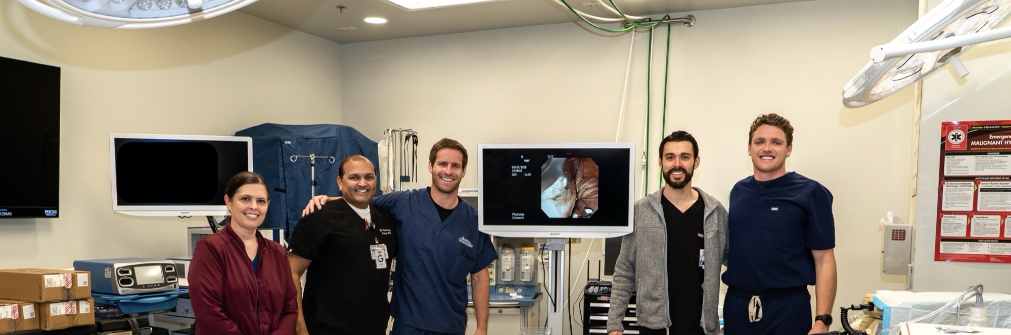 Group photo of the Trinity MSG team and fellows in the endoscopy suite after training